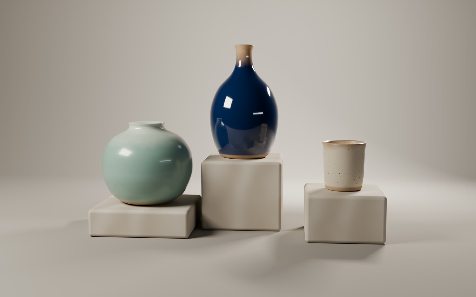 Sample Studio output: three glazed ceramic pieces on travertine plinths