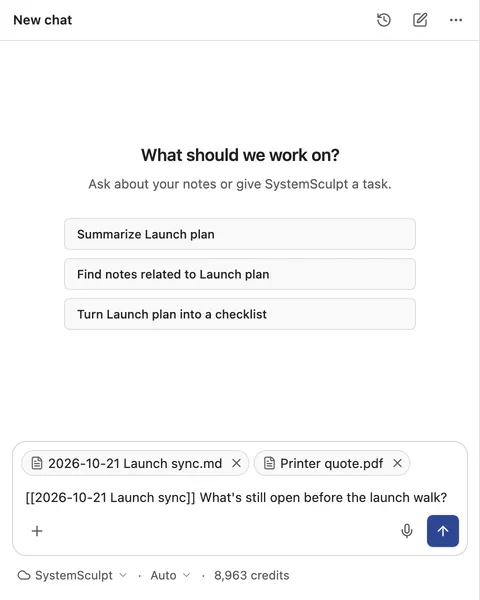 SystemSculpt chat composer with two attachments, the Launch sync note and Printer quote.pdf, and a question being typed.
